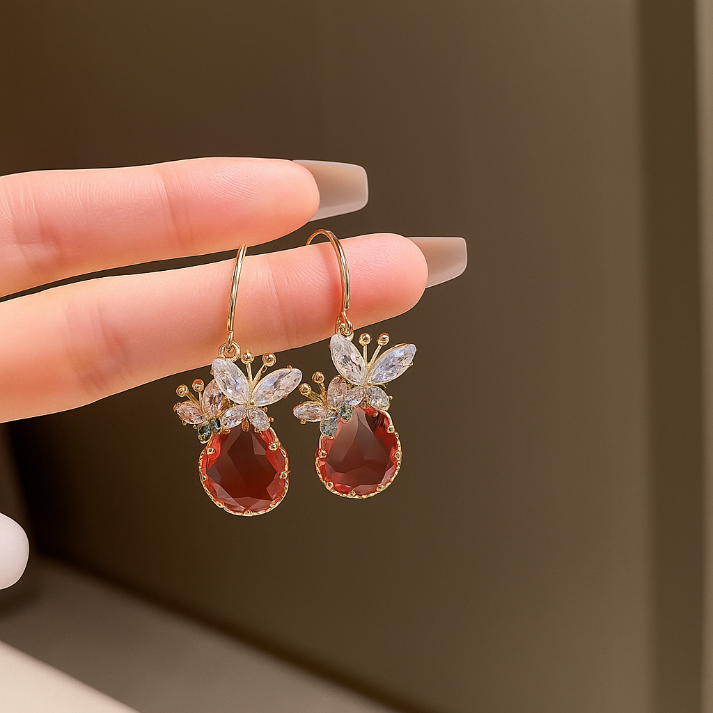 Pendientes de mariposa con circonita y diseño de gota de agua